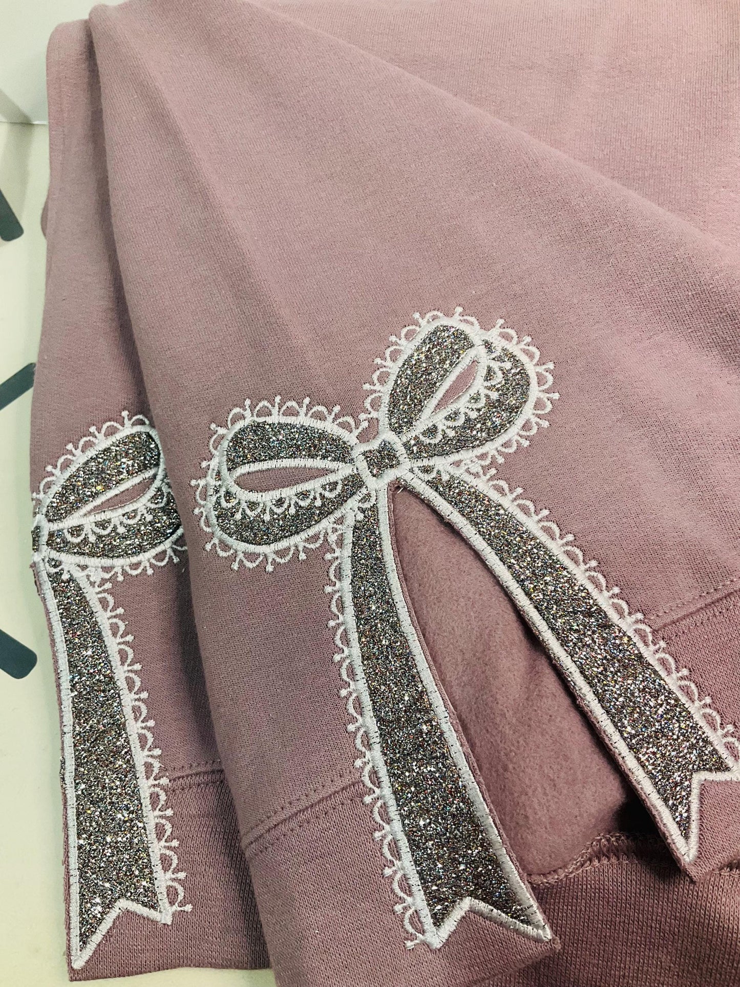 Embroidered Lace Glitter Bow Sweatshirt: Side Appliqué Design